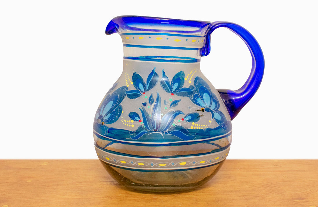 Juego de jarra y 6 vasos filo azul