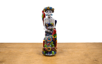 Catrina Frida sentada con animales