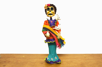 Catrina indita con palomas