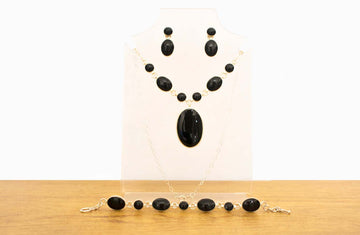 Juego de collar, aretes y pulsera de plata con piedra natural