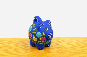Alcancia puerquito azul