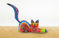 Alebrije gato echado naranja