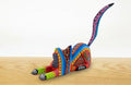 Alebrije gato echado naranja