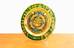 Plato de calendario azteca verde