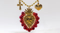 Collar corazón con flama