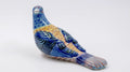 Pájaro picotero azul de cerámica