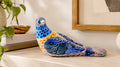 Pájaro picotero azul de cerámica