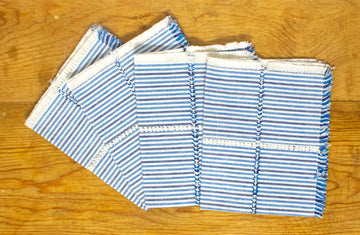 Juego de manteles a rayas azul